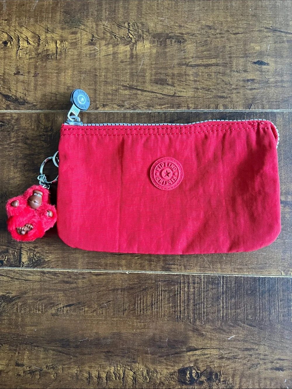 Kipling Bright Red Zip Pouch with Monkey Charm